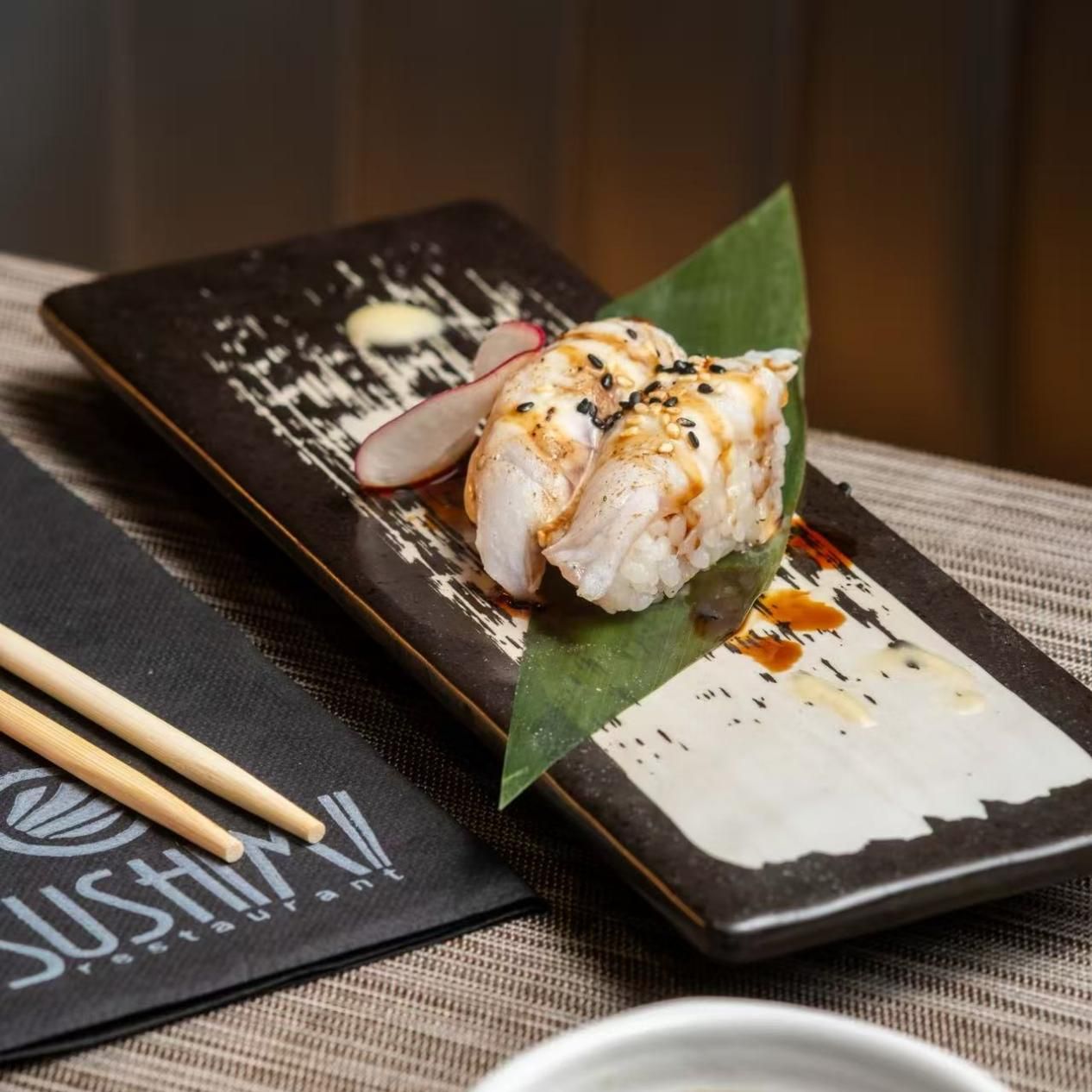 NIGIRI DE LUBINA FLAMEADO